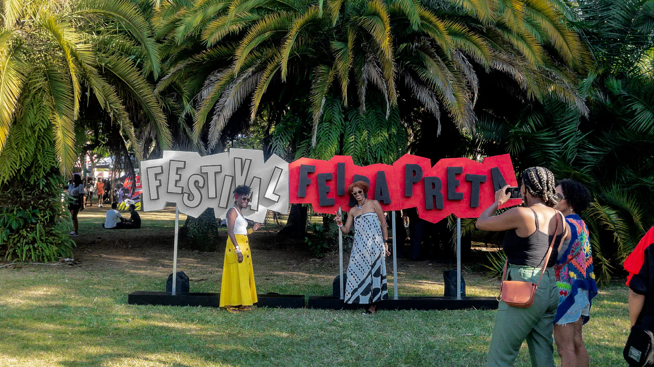 Big Feira Preta letters on the lawn at Ibirapuera Park