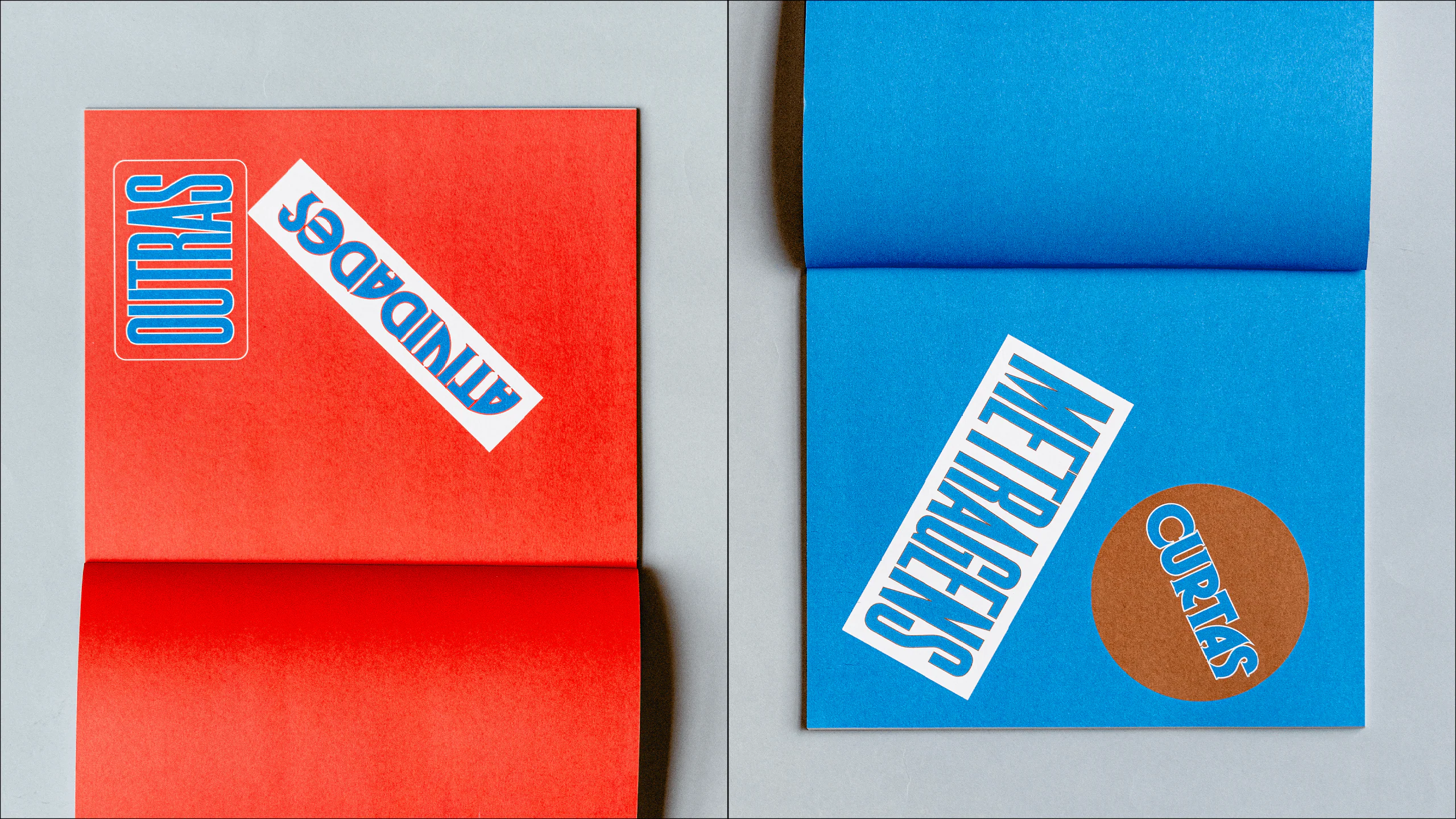 Booklet spreads with sticker-like section titles